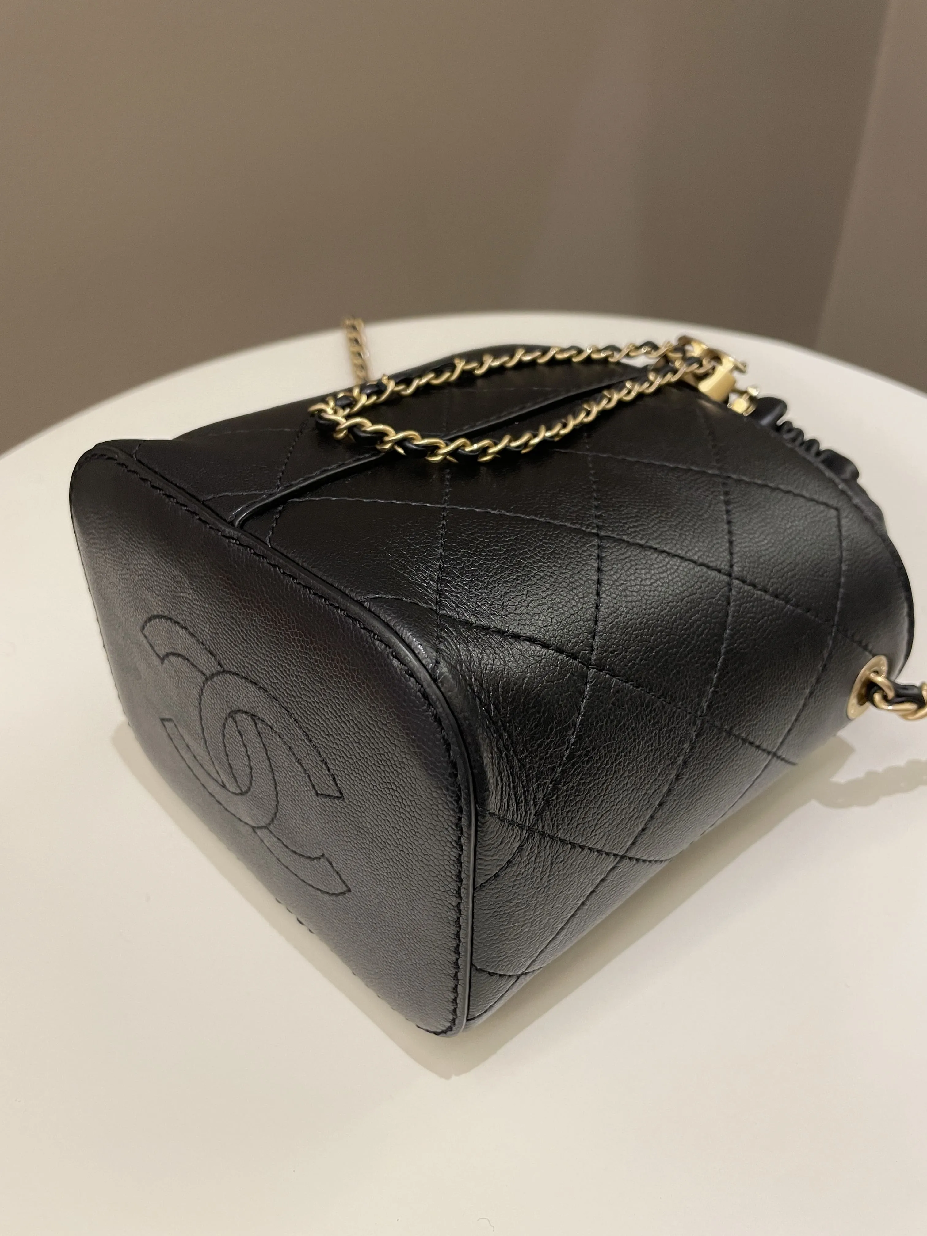 Chanel Cc Quilted Drawstring Bucket Black Caviar / Lambskin
