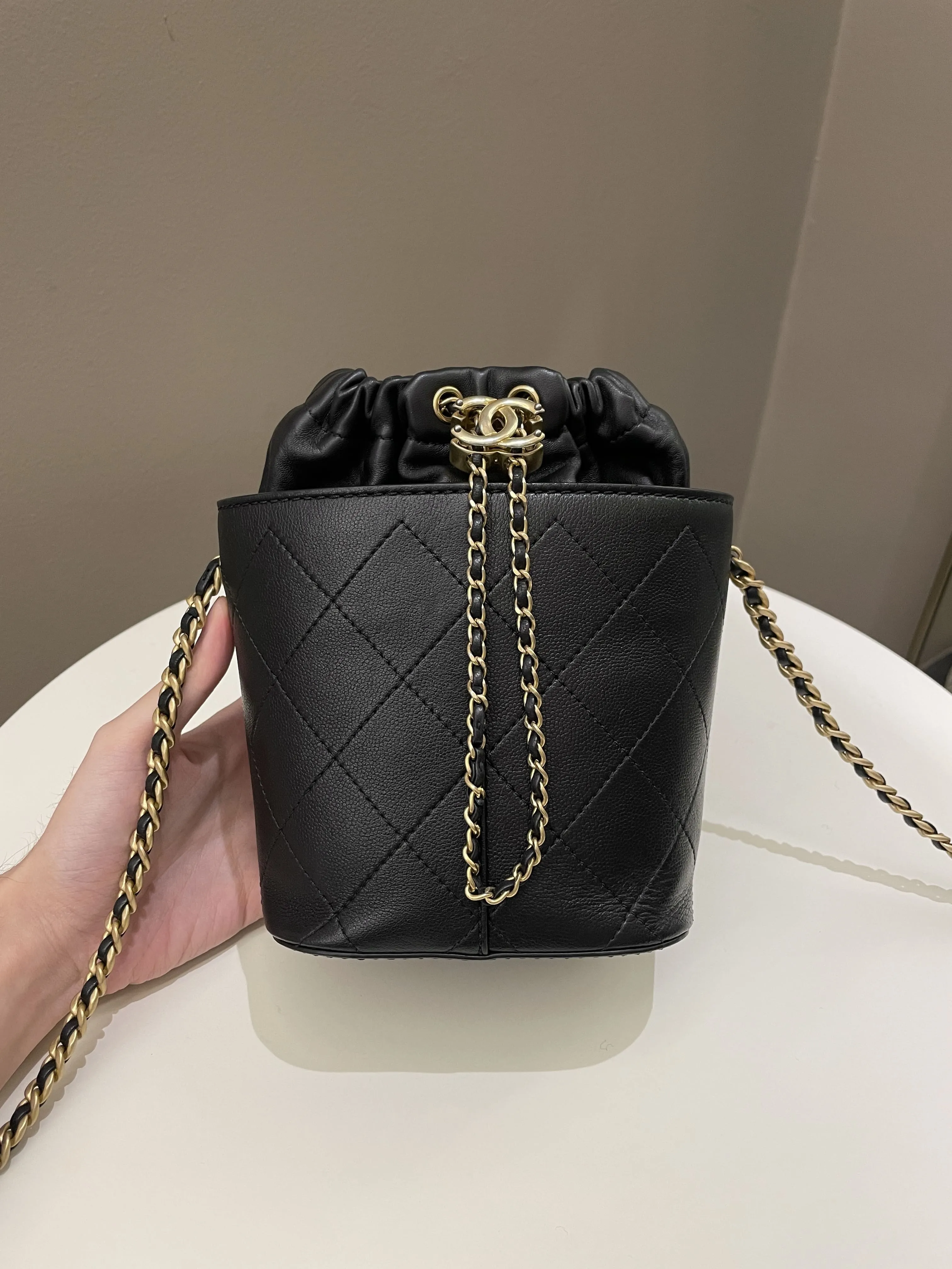 Chanel Cc Quilted Drawstring Bucket Black Caviar / Lambskin