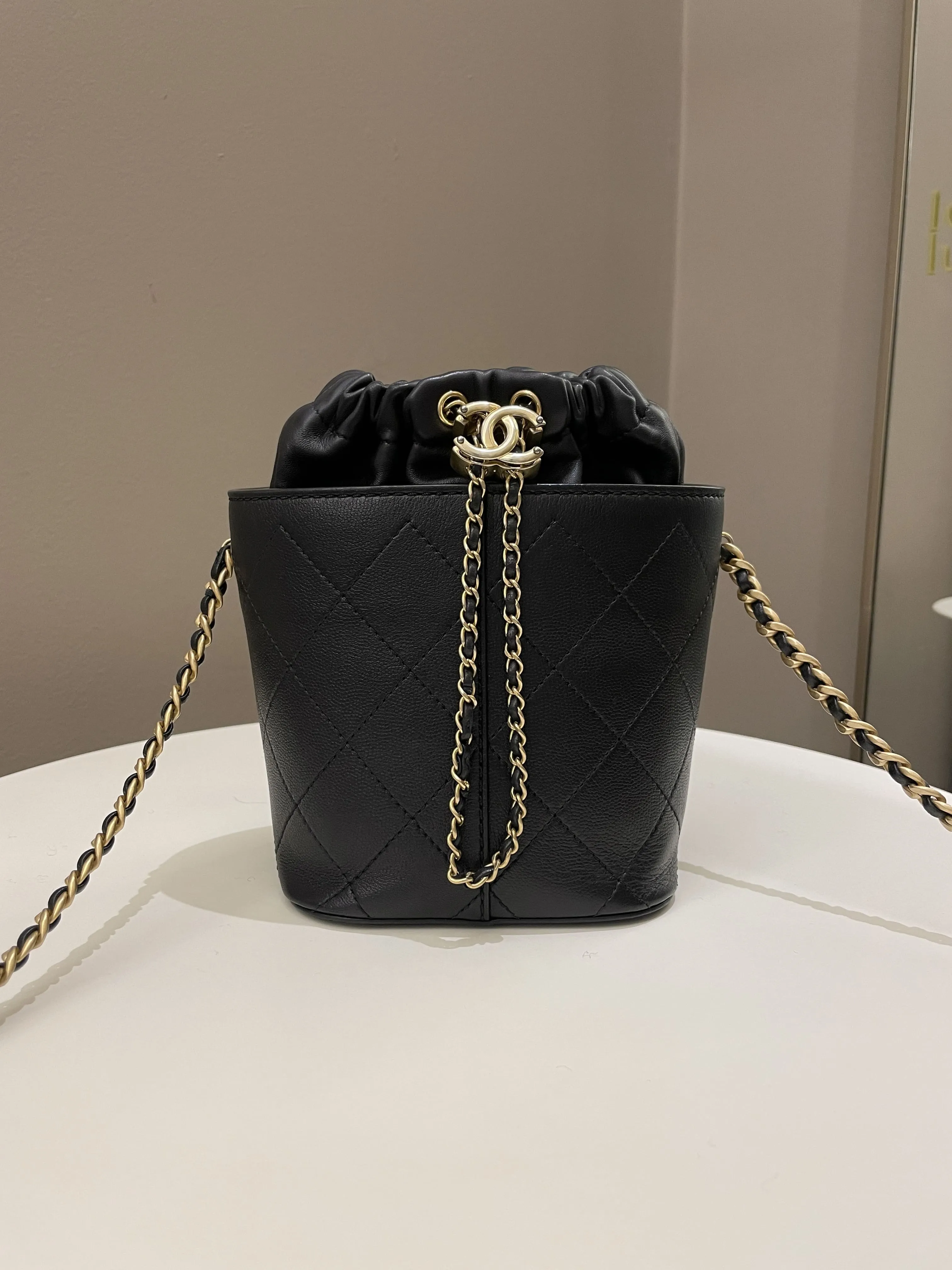 Chanel Cc Quilted Drawstring Bucket Black Caviar / Lambskin