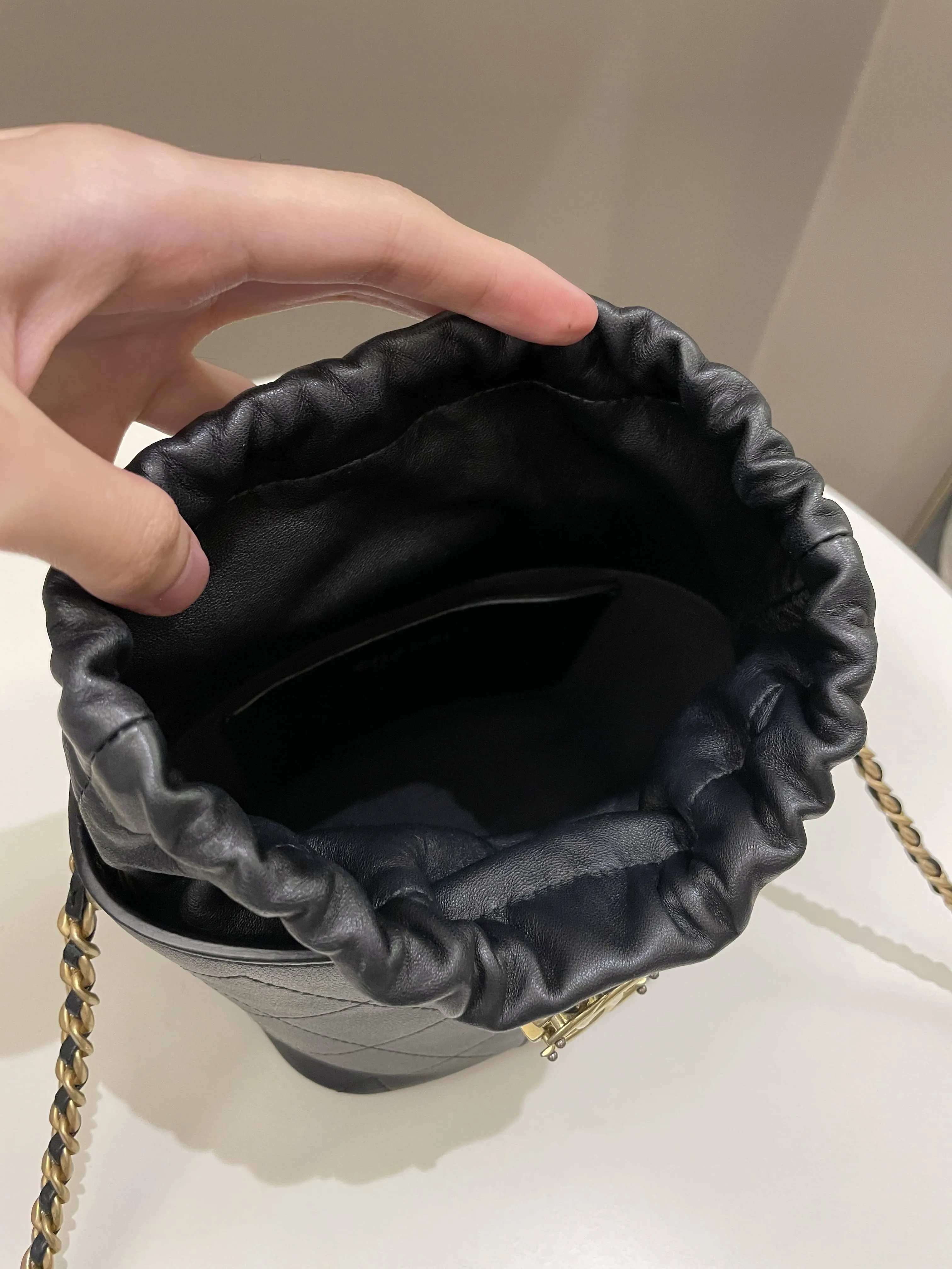 Chanel Cc Quilted Drawstring Bucket Black Caviar / Lambskin