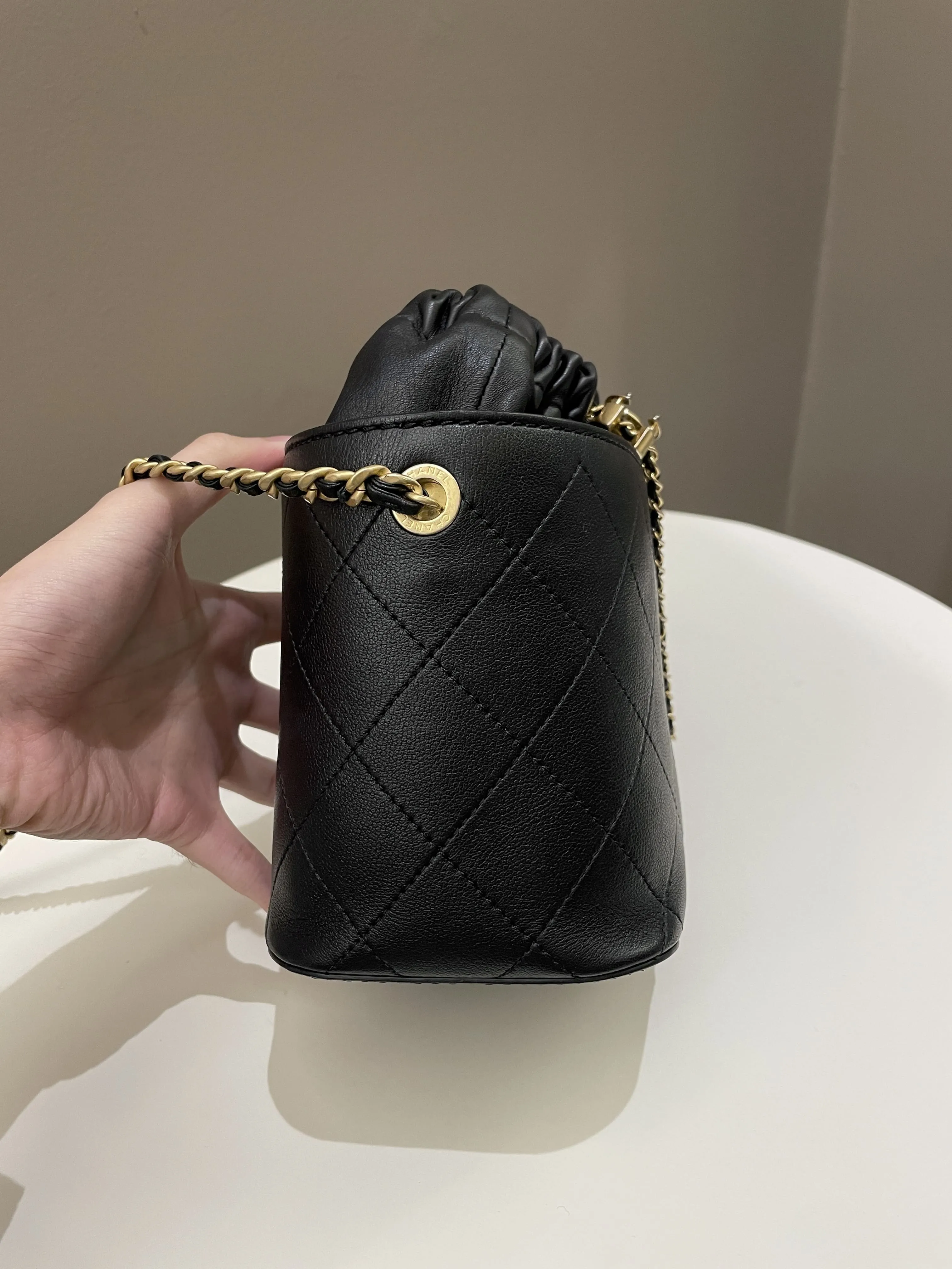 Chanel Cc Quilted Drawstring Bucket Black Caviar / Lambskin