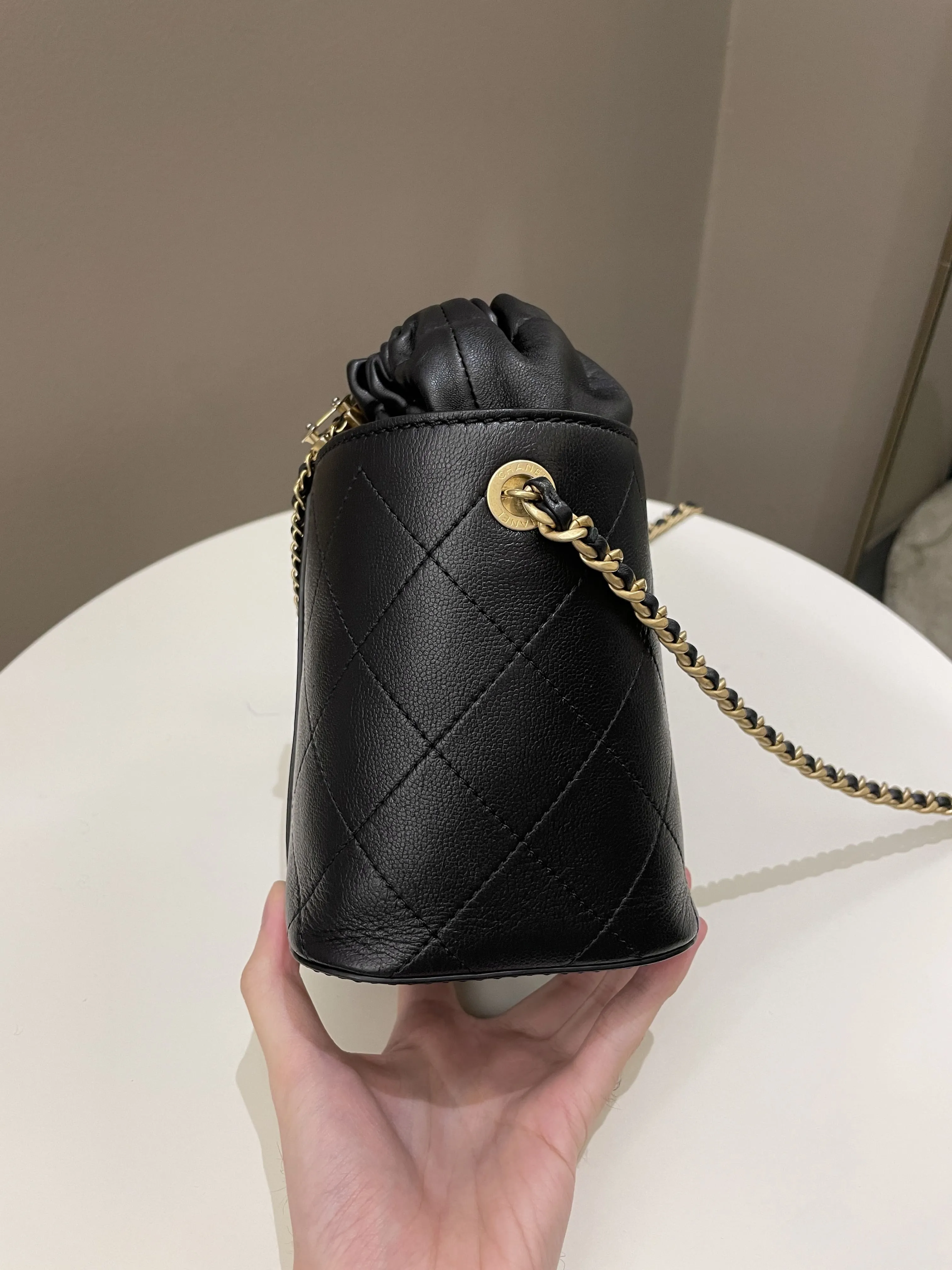 Chanel Cc Quilted Drawstring Bucket Black Caviar / Lambskin