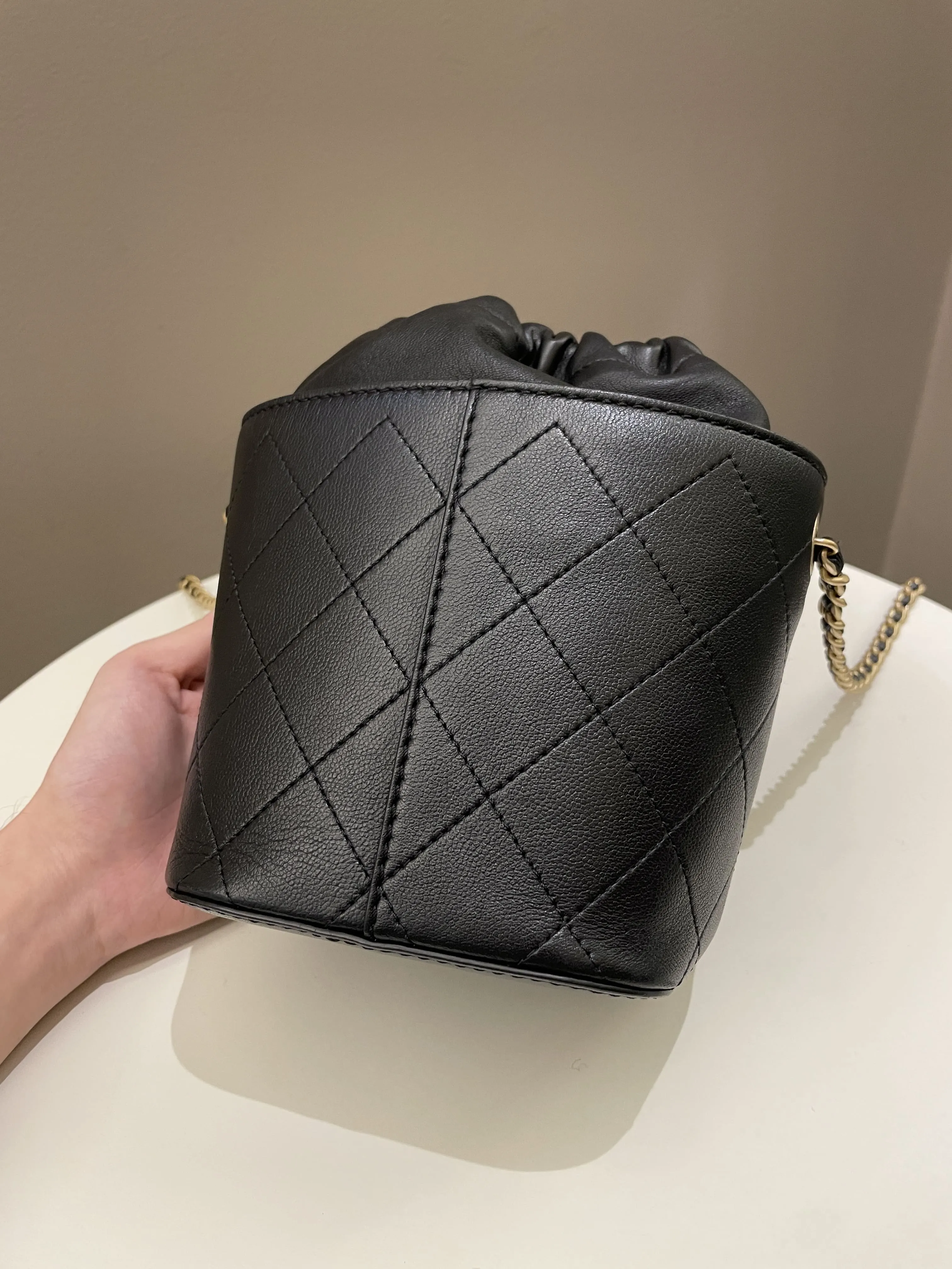Chanel Cc Quilted Drawstring Bucket Black Caviar / Lambskin